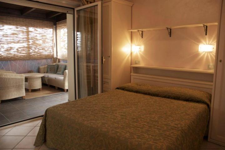 Hotel Residence Veliero ริชโชเน ภายนอก รูปภาพ
